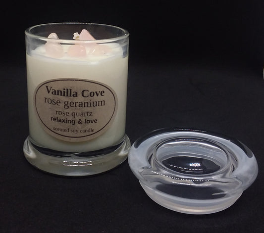 Vanilla Cove Soy Candle 45 hour Rose Geranium fragrance with Rose Quartz crystals in clear glass jar and glass lid
