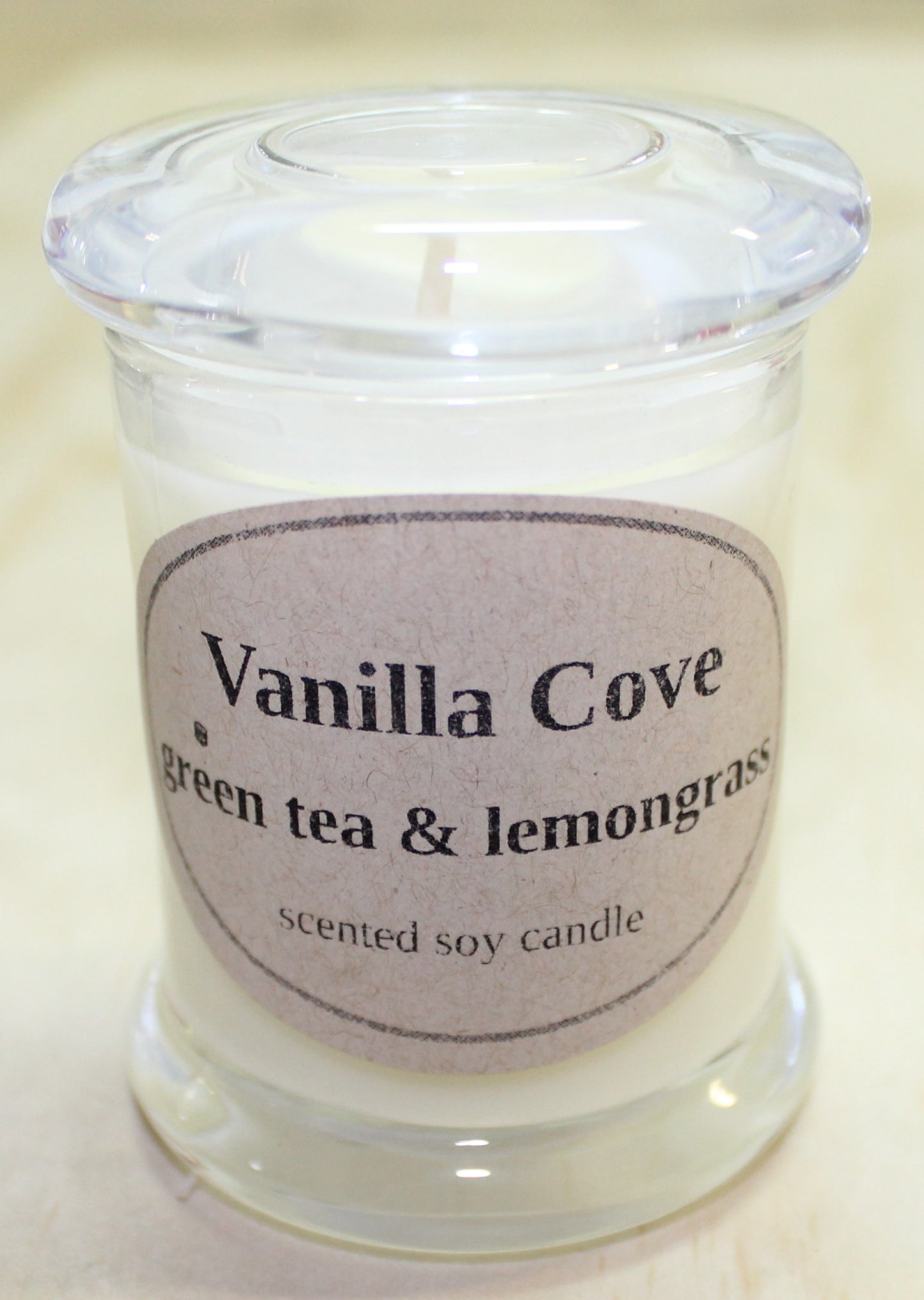 Vanilla Cove Soy Candle 20 hour green tea and lemongrass clear glass jar and glass lid