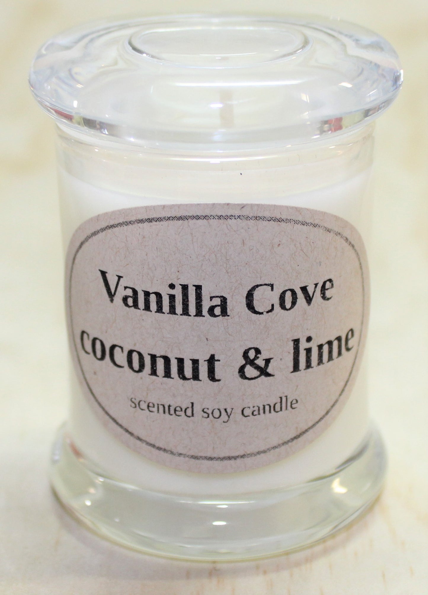 Vanilla Cove Soy Candle 20 hour coconut and lime fragrance clear glass jar and glass lid