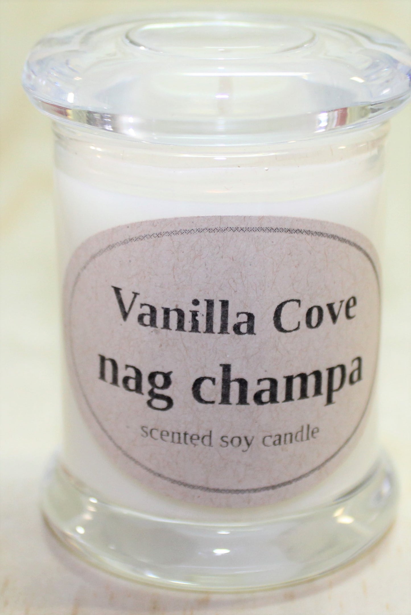 Vanilla Cove Soy Candle 20 hour nag champa fragrance clear glass jar and glass lid