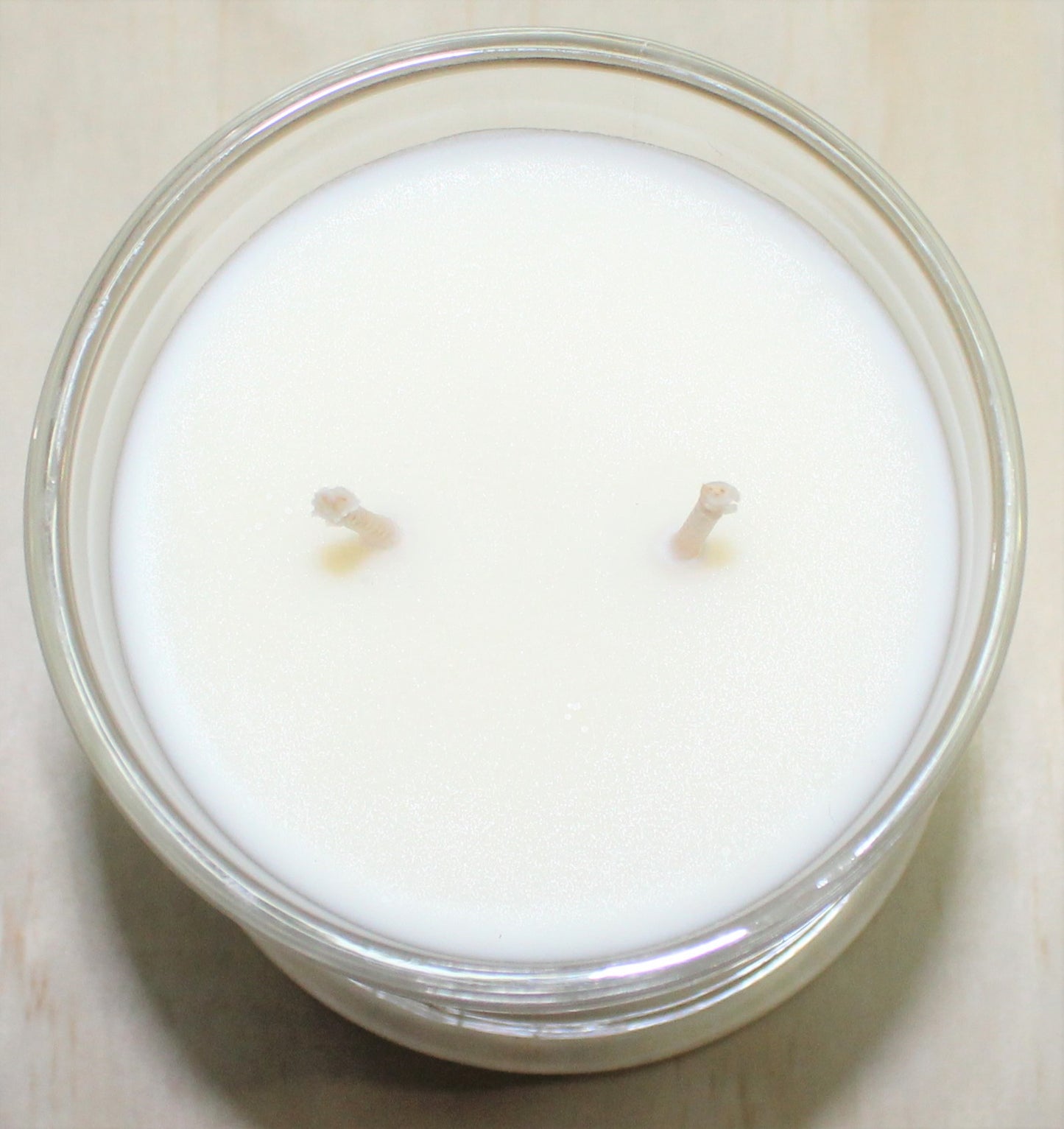 Vanilla Cove Soy Candle 50 hour Coconut and Lime Fragrance in clear glass jar no lid image shows 2 wicks