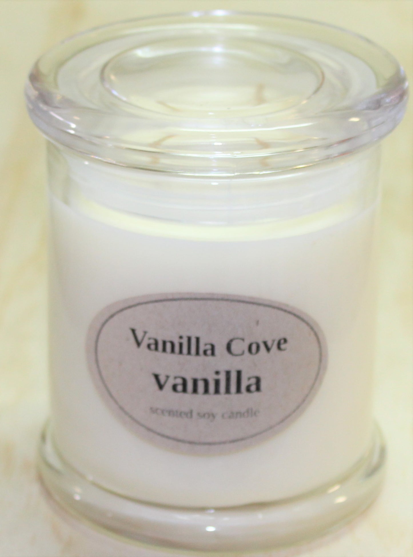Vanilla Cove Soy Candle 50 hour Vanilla Fragrance in clear glass jar and glass lid